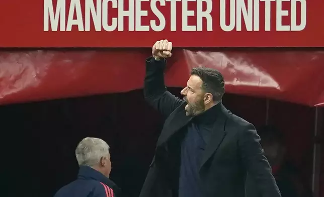 Manchester United's head coach Ruud van Nistelrooij reacts as he arrives prior to the start of the English League Cup soccer match between Manchester United and Leicester City at the Old Trafford stadium in Manchester, England, Wednesday, Oct. 30, 2024. (AP Photo/Dave Thompson)