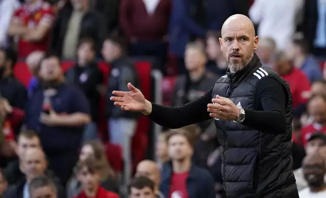 Manchester United's head coach Erik ten Hag reacts during the English Premier League soccer match between Manchester United and Brentford at Old Trafford stadium in Manchester, England, Saturday, Oct. 19, 2024. (AP Photo/Dave Thompson)