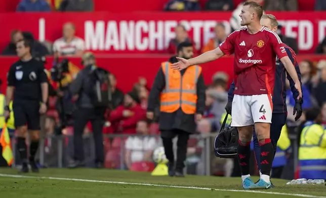 Manchester United's Matthijs de Ligt reacts during the English Premier League soccer match between Manchester United and Brentford at Old Trafford stadium in Manchester, England, Saturday, Oct. 19, 2024. (AP Photo/Dave Thompson)