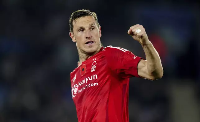 Nottingham Forest's Chris Wood celebrates scoring their side's second goal of the game during the Premier League match at the King Power Stadium, in Leicester, England, Friday Oct. 25, 2024. (Mike Egerton/PA via AP)