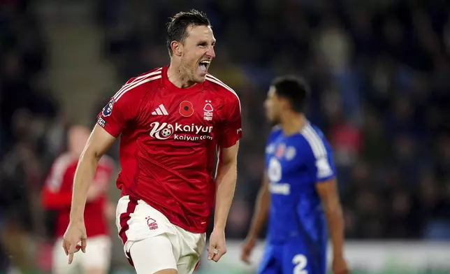 Nottingham Forest's Chris Wood celebrates scoring their side's second goal of the game during the Premier League match at the King Power Stadium, in Leicester, England, Friday Oct. 25, 2024. (Mike Egerton/PA via AP)