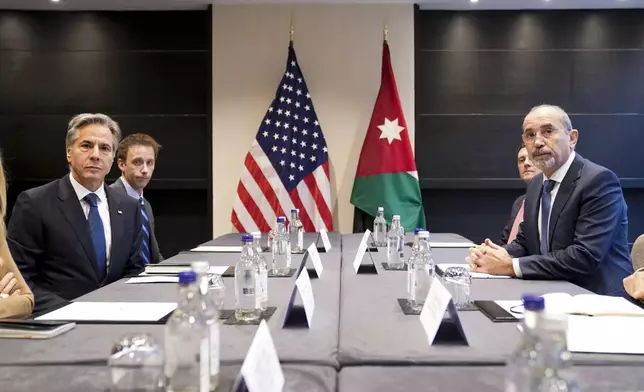 U.S. Secretary of State Antony Blinken meets with Jordanian Foreign Minister Ayman Safadi in London Britain, Friday, Oct. 25, 2024. (Nathan Howard/Pool photo via AP)