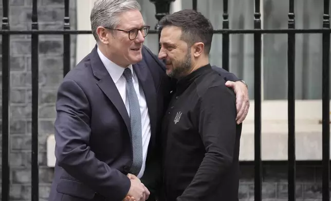 Britain's Prime Minister Keir Starmer welcomes Ukrainian President Volodymyr Zelenskyy to 10 Downing Street in London, Thursday, Oct. 10, 2024.(AP Photo/Kin Cheung)