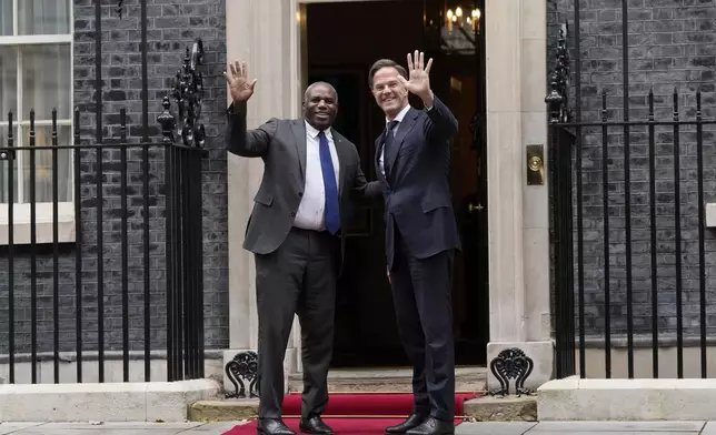 Britain's Foreign Secretary David Lammy and NATO Secretary General Mark Rutte arrive at 10 Downing Street in London, Thursday, Oct. 10, 2024.(AP Photo/Alastair Grant)