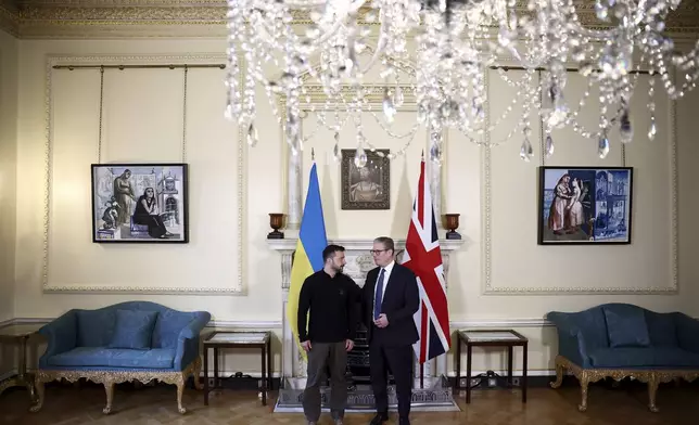 Britain's Prime Minister Keir Starmer, right, and Ukraine's President Volodymyr Zelenskyy speak during a bilateral meeting inside 10 Downing Street, in London, Thursday Oct. 10, 2024. (Henry Nicholls/Pool Photo via AP)