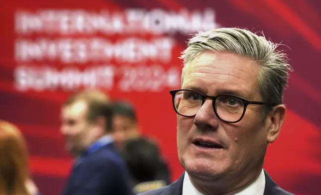 British Prime Minister Sir Keir Starmer speaks with leaders from across the UK during the International Investment Summit in London, Monday, Oct. 14, 2024. (Jonathan Brady/Pool Photo via AP)