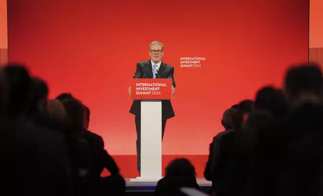 Britain's Prime Minister Keir Starmer speaks during the International Investment Summit in London, Monday, Oct. 14, 2024. (Jonathan Brady/Pool Photo via AP)