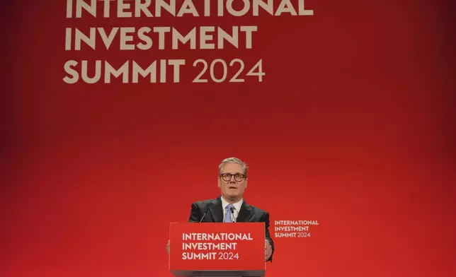 Britain's Prime Minister Keir Starmer speaks during the International Investment Summit in London, Monday, Oct. 14, 2024. (Jonathan Brady/Pool Photo via AP)