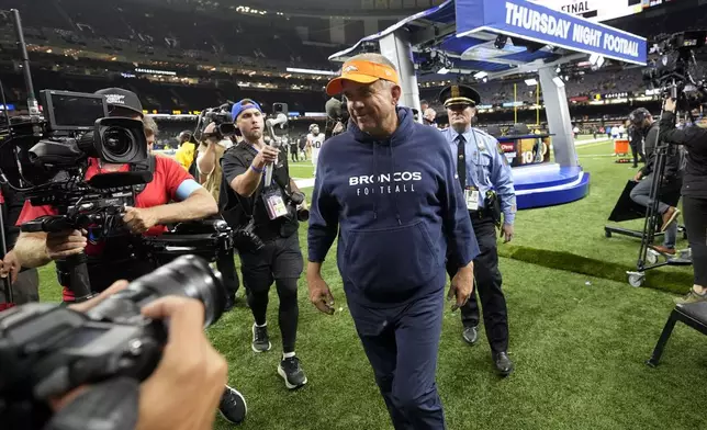 Denver Broncos head coach Sean Payton walks off the field after an NFL football game against the New Orleans Saints, Thursday, Oct. 17, 2024, in New Orleans. The Broncos won 33-10. (AP Photo/Gerald Herbert)