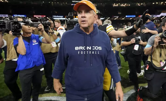 Denver Broncos head coach Sean Payton walks off the field after an NFL football game against the New Orleans Saints, Thursday, Oct. 17, 2024, in New Orleans. The Broncos won 33-10. (AP Photo/Gerald Herbert)