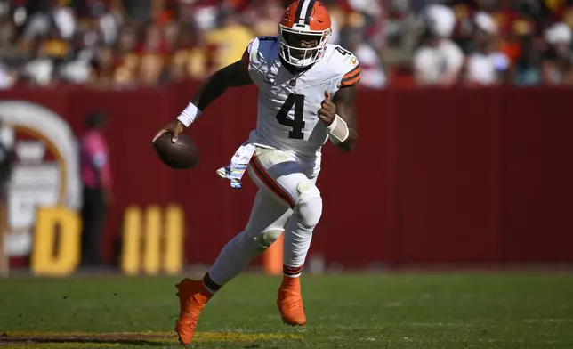 Cleveland Browns quarterback Deshaun Watson (4) scrambles against the Washington Commanders during the second half of an NFL football game in Landover, Md., Sunday, Oct. 6, 2024. (AP Photo/Nick Wass)