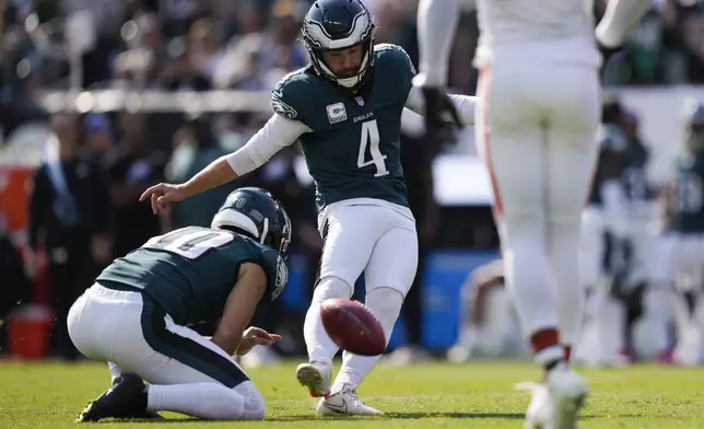 Philadelphia Eagles' Jake Elliott (4) kicks for an extra point during the first half of an NFL football game against the Cleveland Browns on Sunday, Oct. 13, 2024, in Philadelphia. (AP Photo/Matt Rourke)