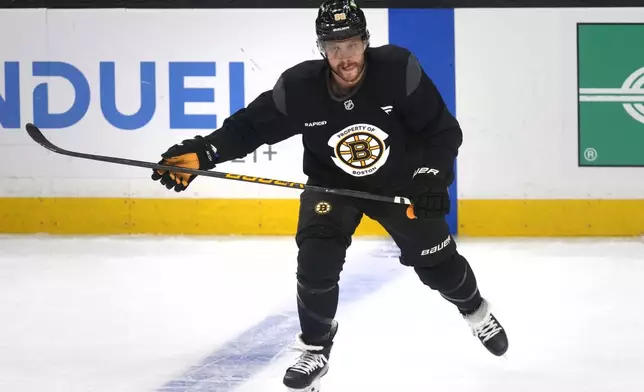 Boston Bruins forward David Pastrnak skates during a team practice, Monday, Sept. 30, 2024, in Boston. (AP Photo/Charles Krupa, Pool)