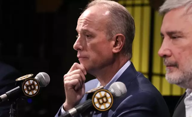 Boston Bruins chief executive officer Charlie Jacobs listens to a reporter's question during a media availability, Monday, Sept. 30, 2024, in Boston. (AP Photo/Charles Krupa)