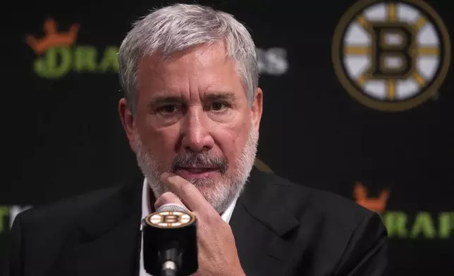 Boston Bruins president Cam Neely answers a reporter's question during a media availability, Monday, Sept. 30, 2024, in Boston. (AP Photo/Charles Krupa)