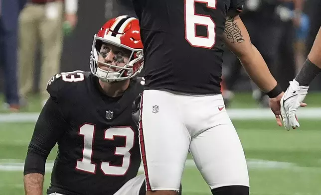 Atlanta Falcons place kicker Younghoe Koo (6) celebrates his field goal against the Tampa Bay Buccaneers during the second half of an NFL football game Thursday, Oct. 3, 2024, in Atlanta. (AP Photo/John Bazemore)