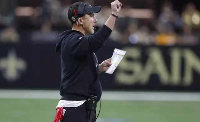 New Orleans Saints head coach Dennis Allen gestures during the first half of an NFL football game against the Tampa Bay Buccaneers in New Orleans, Sunday, Oct. 13, 2024. (AP Photo/Butch Dill)