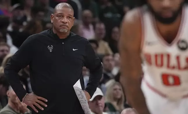 Milwaukee Bucks head coach Doc Rivers watches during the first half of an NBA basketball game Friday, Oct. 25, 2024, in Milwaukee. (AP Photo/Morry Gash)