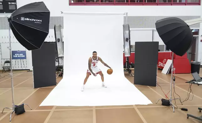 Chicago Bulls guard Lonzo Ball poses during the team's media day, Monday, Sept. 30, 2024, in Chicago. (AP Photo/Charles Rex Arbogast)