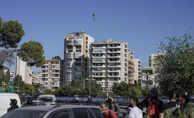 CAPTION CORRECTS TYPE OF MUNITION A bomb dropped from an Israeli jet hits a building in Ghobeiri, Beirut, Lebanon, Tuesday, Oct. 22, 2024. (AP Photo/Bilal Hussein)