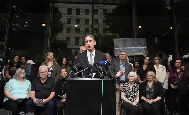 Attorney Brian Freedman speaks during a press conference to announce developments on the case of brothers Erik and Lyle Menendez, Wednesday, Oct. 16, 2024, in Los Angeles. (AP Photo/Damian Dovarganes)