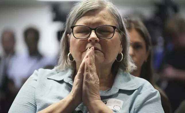 Diane Hernandez niece of Kitty Menendez sits prior to a news conference being held by Los Angeles County District Attorney George Gascon at the Hall of Justice on Thursday, Oct. 24, 2024, in Los Angeles. (AP Photo/Eric Thayer)