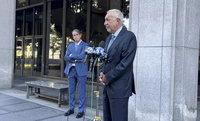 Attorney Mark Geragos informs the media on developments on the case of brothers Lyle and Erik Menendez, both serving life sentences for the murder of their parents in 1989, Thursday, Oct. 3, 2024 in Los Angeles. (AP Photo/Jaimie Ding)