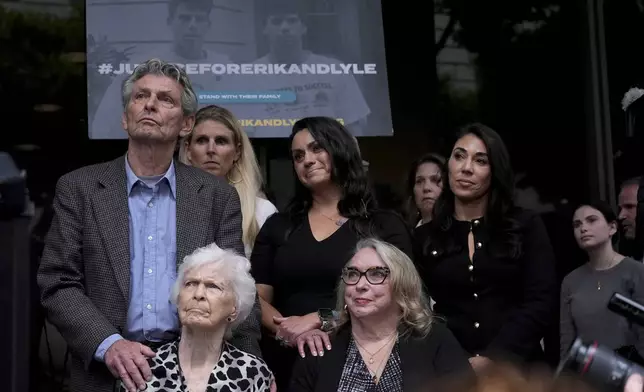 Kitty Menendez' sister, Joan Andersen VanderMolen, bottom left, and niece Karen VanderMolen, right, sit together during a press conference to announce developments on the case of brothers Erik and Lyle Menendez, Wednesday, Oct. 16, 2024, in Los Angeles. (AP Photo/Damian Dovarganes)