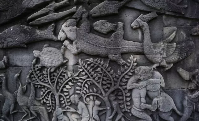 Carvings depicting crocodiles on a wall of Bayon Temple, near Cambodia's world-famous Angkor Wat Temple in Siem Reap Province, on Aug. 2, 2024. (AP Photo/Aniruddha Ghosal)