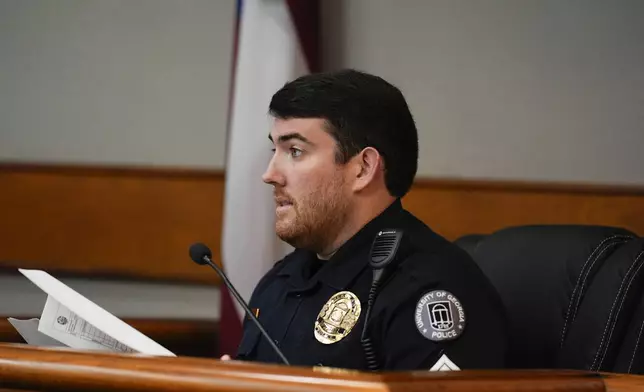 Sgt. Joshua Epps of the University of Georgia Police Department testifies as Jose Ibarra, accused of killing a nursing student, Laken Hope Riley, appears in court for a motion hearing on Friday, Oct. 11, 2024, in Athens, Ga. (AP Photo/Brynn Anderson, Pool)