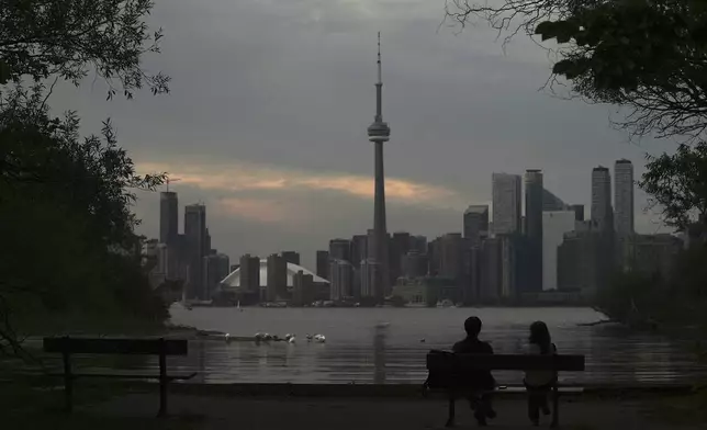 The Toronto skyline is seen from Wards Island in Toronto on Thursday, Sept. 19, 2024. (AP Photo/Angie Wang)