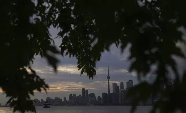 The Toronto skyline is seen from Wards Island in Toronto on Thursday, Sept. 19, 2024. (AP Photo/Angie Wang)