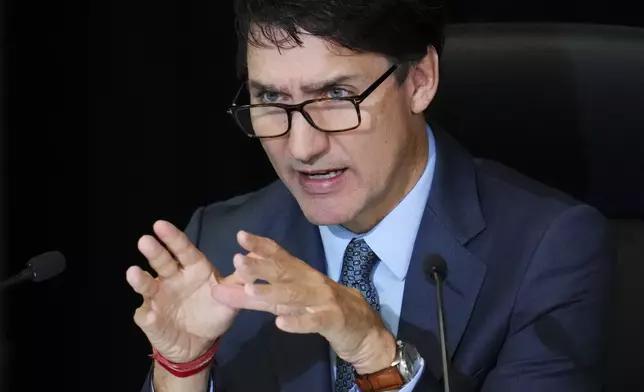 Canada's Prime Minister Justin Trudeau testifies at the Foreign Interference Commission in Ottawa, Ontario, Wednesday, Oct. 16, 2024. (Sean Kilpatrick/The Canadian Press via AP)