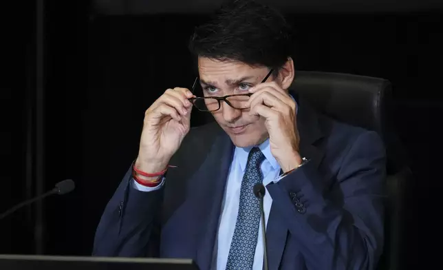 Canada's Prime Minister Justin Trudeau appears as a witness at the Foreign Interference Commission in Ottawa, Ontario, Wednesday, Oct. 16, 2024. (Sean Kilpatrick/The Canadian Press via AP)