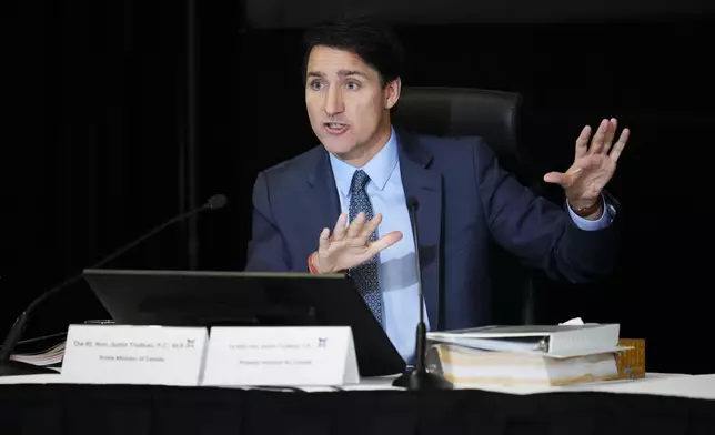 Canada's Prime Minister Justin Trudeau testifies at the Foreign Interference Commission in Ottawa, Ontario, Wednesday, Oct. 16, 2024. (Sean Kilpatrick/The Canadian Press via AP)