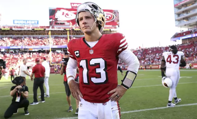 San Francisco 49ers' Brock Purdy stands on the field after an NFL football game against the Arizona Cardinals in Santa Clara, Calif., Sunday, Oct. 6, 2024. (Scott Strazzante/San Francisco Chronicle via AP)