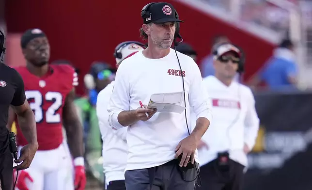 San Francisco 49ers head coach Kyle Shanahan walks on the sideline during the second half of an NFL football game against the Arizona Cardinals in Santa Clara, Calif., Sunday, Oct. 6, 2024. (AP Photo/Godofredo A. Vásquez)