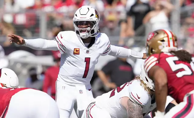 Arizona Cardinals quarterback Kyler Murray (1) gestures behind center at the line of scrimmage during the first half of an NFL football game against the San Francisco 49ers in Santa Clara, Calif., Sunday, Oct. 6, 2024. (AP Photo/Godofredo A. Vásquez)