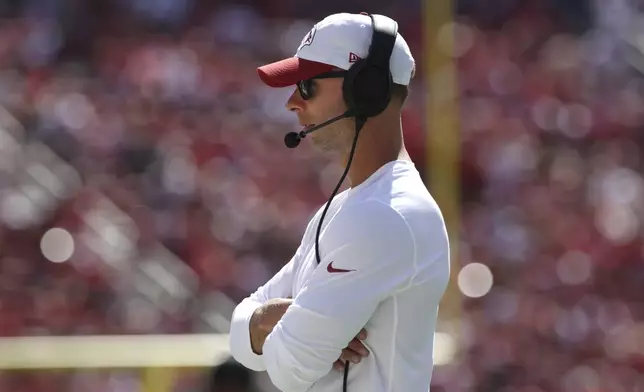 Arizona Cardinals head coach Jonathan Gannon watches from the sideline during the first half of an NFL football game against the San Francisco 49ers in Santa Clara, Calif., Sunday, Oct. 6, 2024. (AP Photo/Jed Jacobsohn)