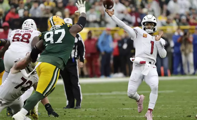 Arizona Cardinals quarterback Kyler Murray (1) throws during the first half of an NFL football game against the Green Bay Packers, Sunday, Oct. 13, 2024, in Green Bay. (AP Photo/Mike Roemer)