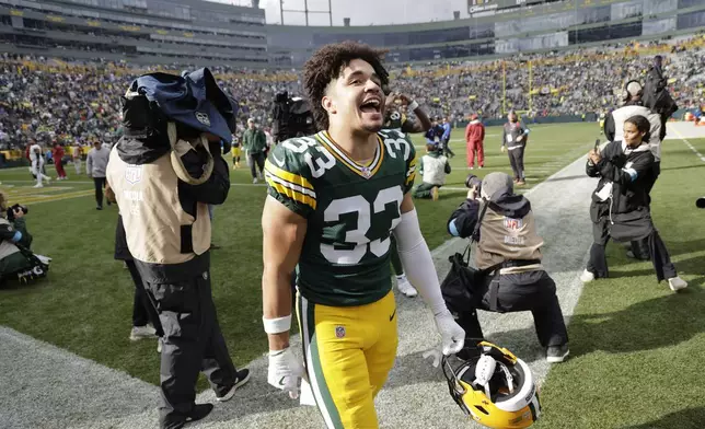 Green Bay Packers safety Evan Williams walks off the field after an NFL football game against the Arizona Cardinals, Sunday, Oct. 13, 2024, in Green Bay. (AP Photo/Mike Roemer)