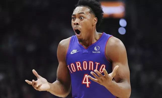 Toronto Raptors' Scottie Barnes (4) reacts after being called for a foul against the Cleveland Cavaliers during the first half of an NBA basketball game, Wednesday, Oct. 23, 2024 in Toronto. (Frank Gunn/The Canadian Press via AP)