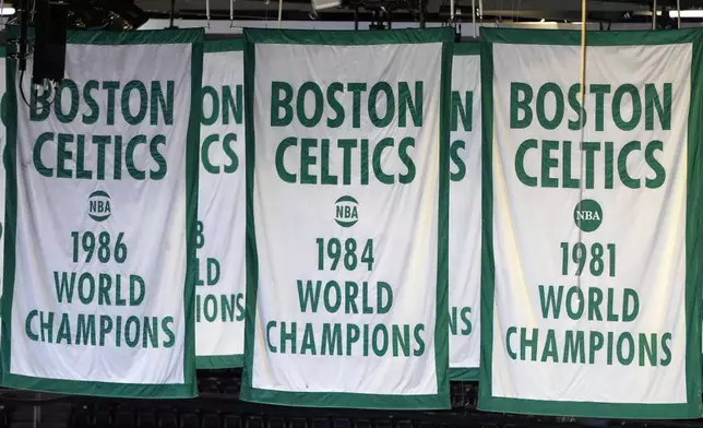 FILE - Boston Celtics basketball banners are seen in the rafters at TD Garden, Wednesday, March. 27, 2024, in Boston. (AP Photo/Michael Dwyer, File)