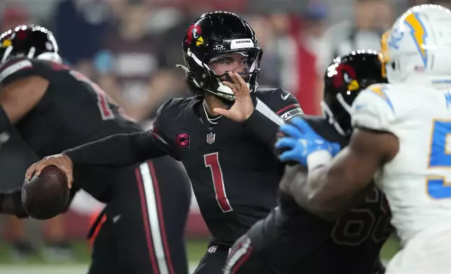 Arizona Cardinals quarterback Kyler Murray (1) throws a pass during the second half of an NFL football game against the Los Angeles Chargers, Monday, Oct. 21, 2024, in Glendale Ariz. (AP Photo/Matt York)