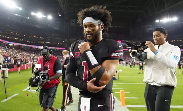 Arizona Cardinals quarterback Kyler Murray walks off the field after an NFL football game against the Los Angeles Chargers, Monday, Oct. 21, 2024, in Glendale Ariz. (AP Photo/Ross D. Franklin)