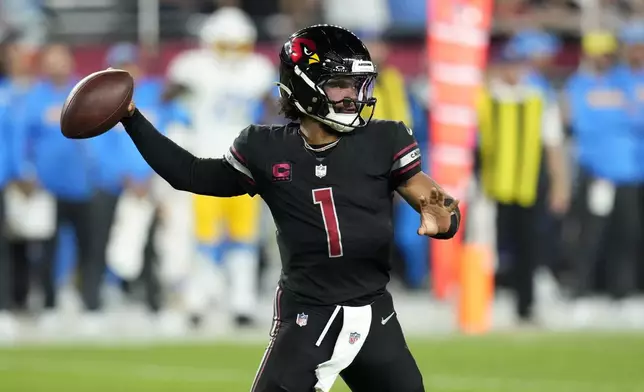 Arizona Cardinals quarterback Kyler Murray throws a pass during the first half of an NFL football game against the Los Angeles Chargers, Monday, Oct. 21, 2024, in Glendale Ariz. (AP Photo/Ross D. Franklin)