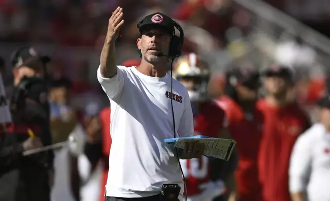 San Francisco 49ers head coach Kyle Shanahan gestures from the sideline during the first half of an NFL football game against the Kansas City Chiefs in Santa Clara, Calif., Sunday, Oct. 20, 2024. (AP Photo/Eakin Howard)