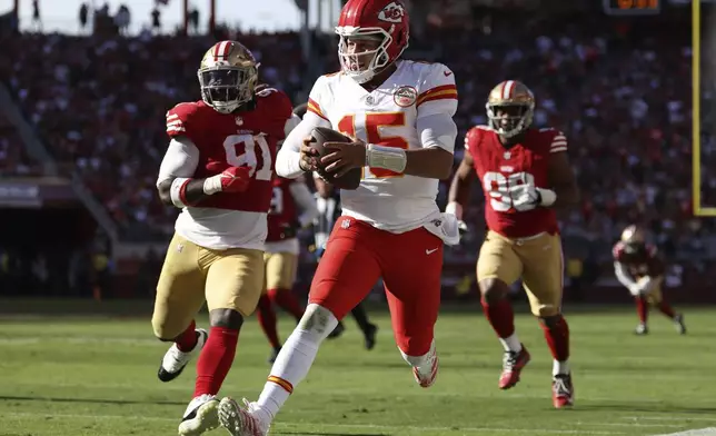 Kansas City Chiefs quarterback Patrick Mahomes (15) runs against the San Francisco 49ers during the second half of an NFL football game in Santa Clara, Calif., Sunday, Oct. 20, 2024. (AP Photo/Jed Jacobsohn)