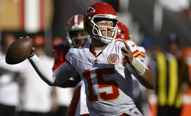 Kansas City Chiefs quarterback Patrick Mahomes (15) passes against the San Francisco 49ers during the second half of an NFL football game in Santa Clara, Calif., Sunday, Oct. 20, 2024. (AP Photo/Eakin Howard)