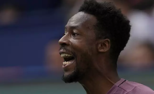 Gael Monfils of France reacts during the men's singles fourth round match against Carlos Alcaraz of Spain, in the Shanghai Masters tennis tournament at Qizhong Forest Sports City Tennis Center in Shanghai, China, Wednesday, Oct. 9, 2024. (AP Photo/Andy Wong)